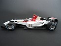 1:43 Minichamps Bar Honda 6 2004 White W/Red Stripes. Uploaded by indexqwest